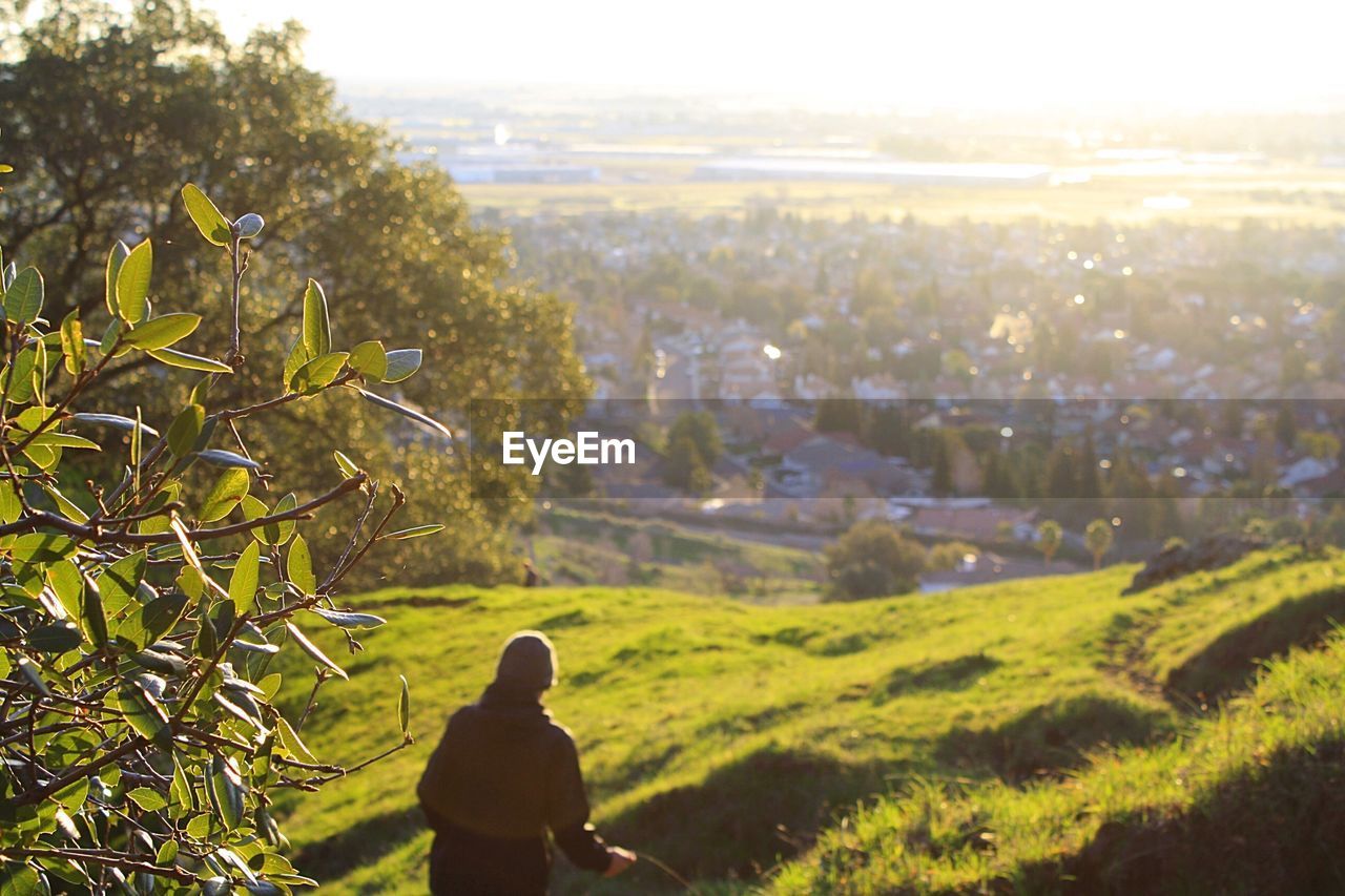 High angle view of person hiking on hill