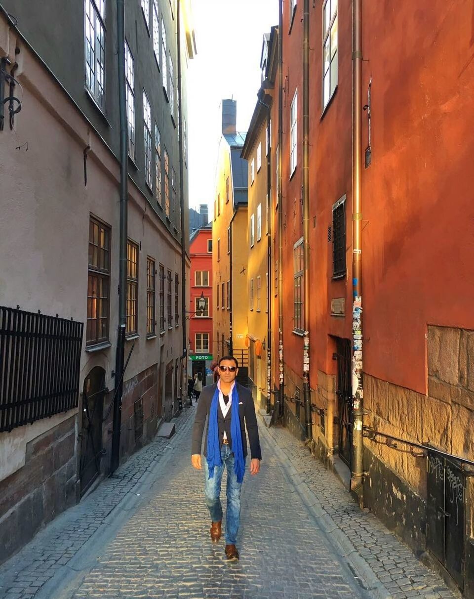 WOMAN WALKING IN CITY