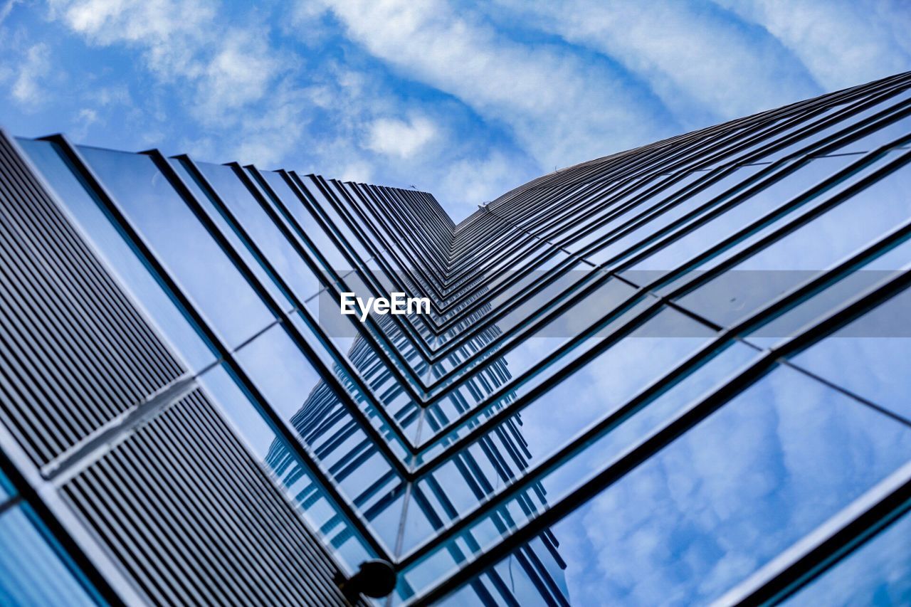 Low angle view of skyscraper against sky