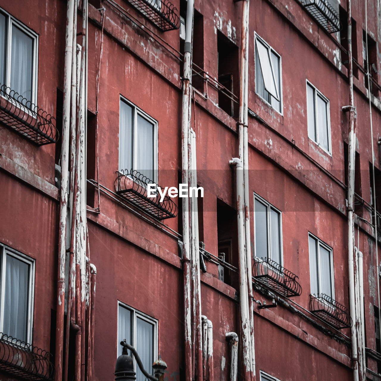 LOW ANGLE VIEW OF APARTMENT BUILDING