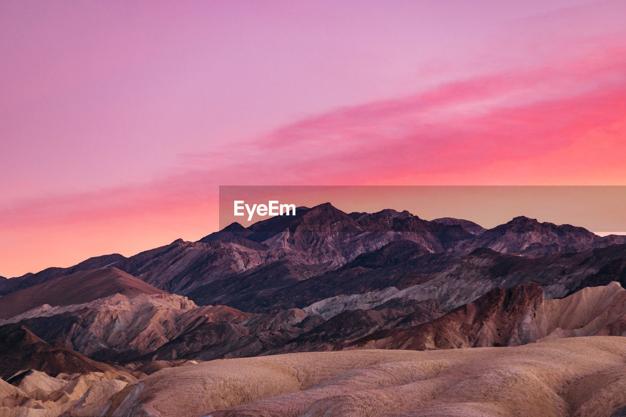 Scenic view of mountains against sky during sunset