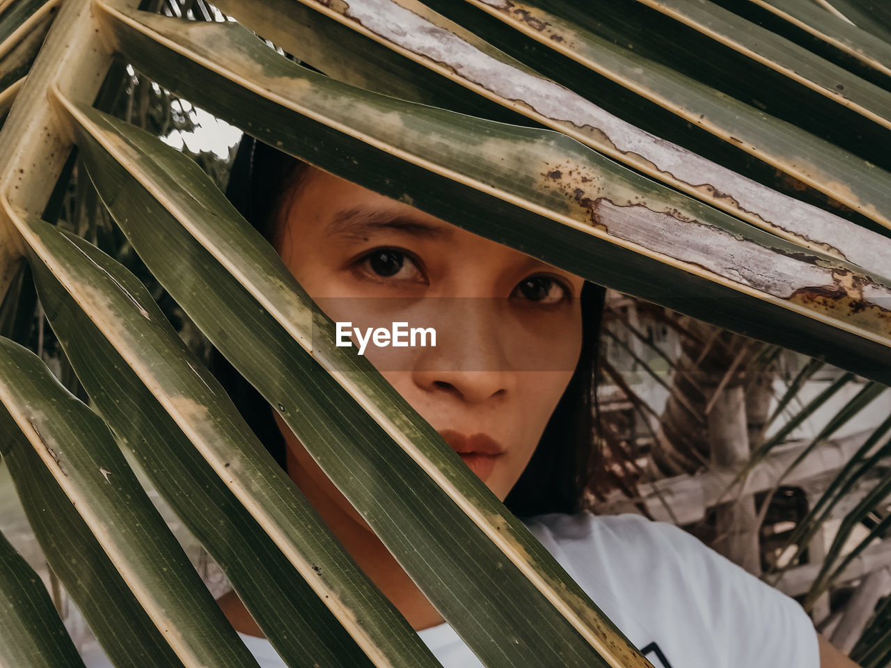 Close-up portrait of girl looking down