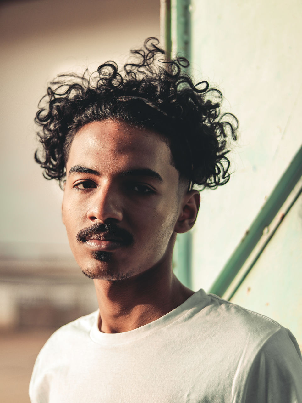 Portrait of young man looking away