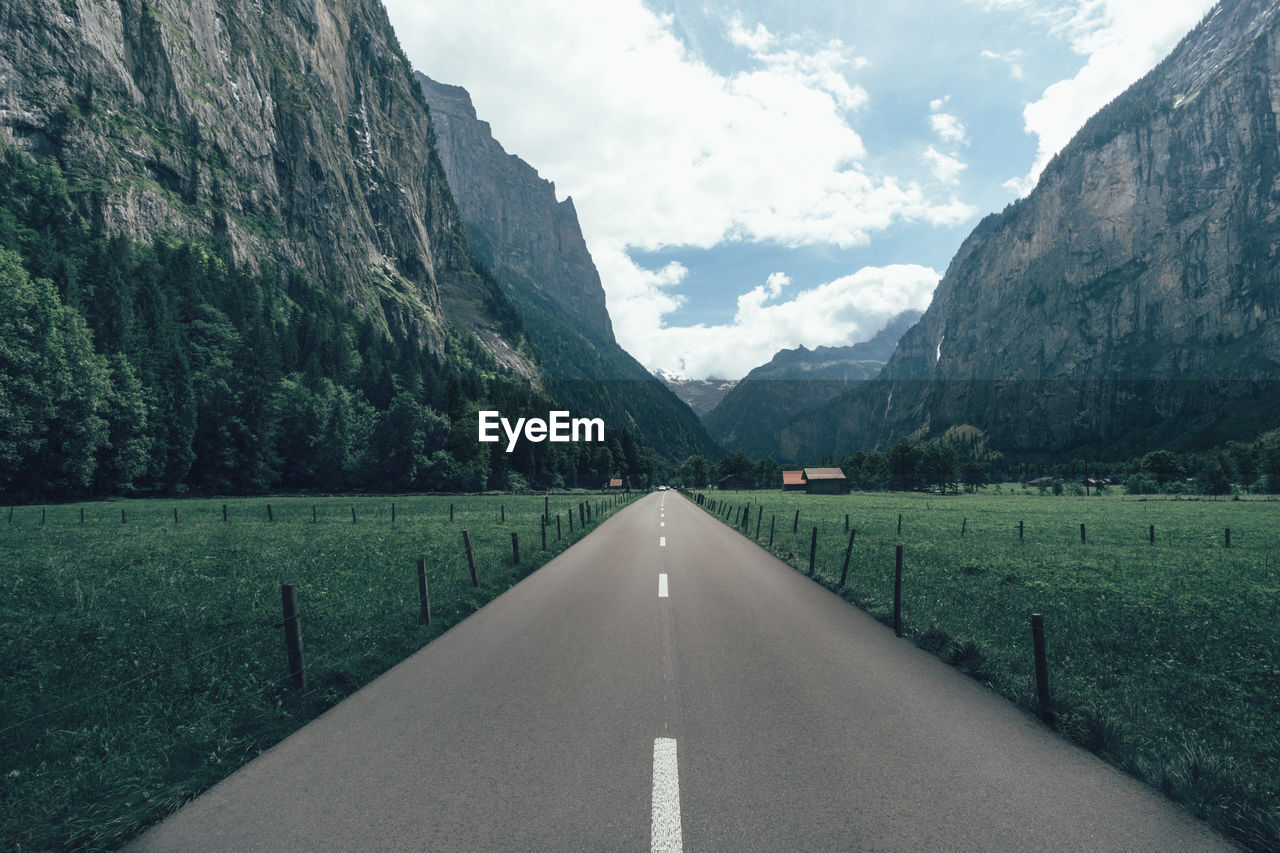 Road passing through mountain landscape