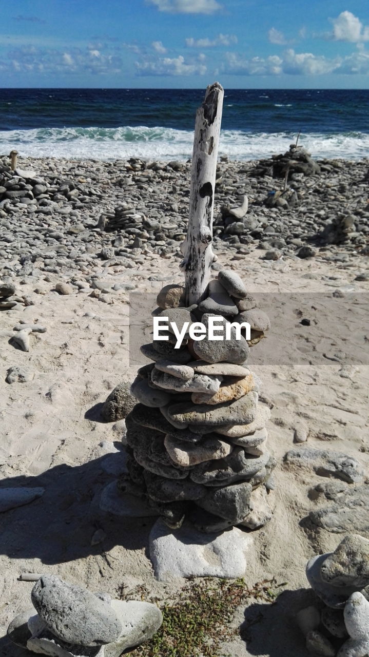 STACK OF ROCKS ON BEACH