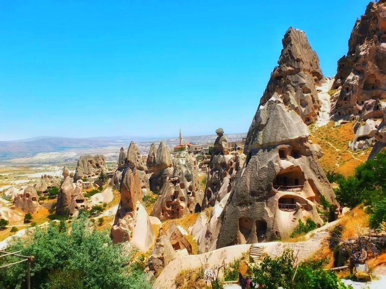 Panoramic view of rock formations against sky