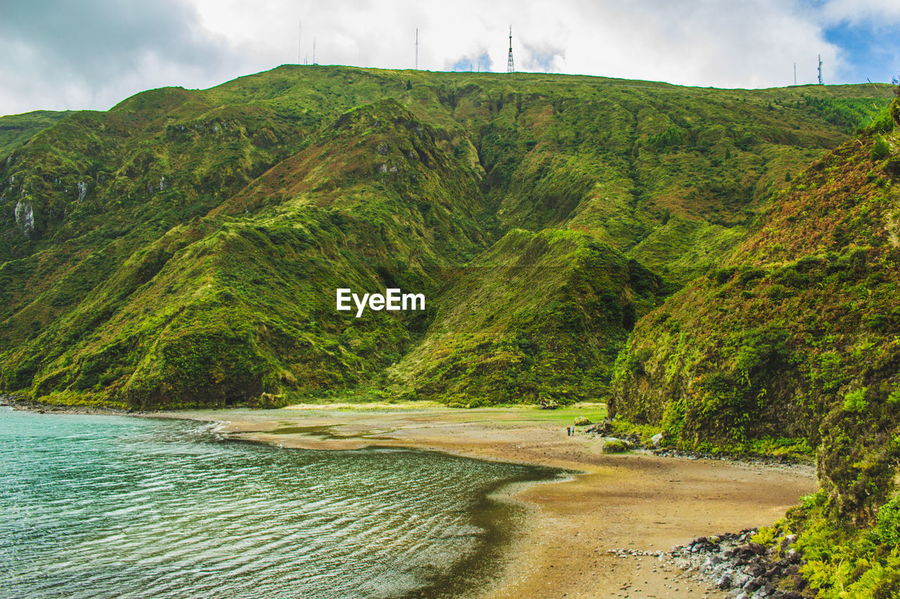 SCENIC VIEW OF RIVER AND TREES AGAINST SKY