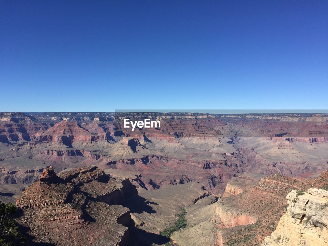 Scenic view of grand canyon national park against clear blue sky