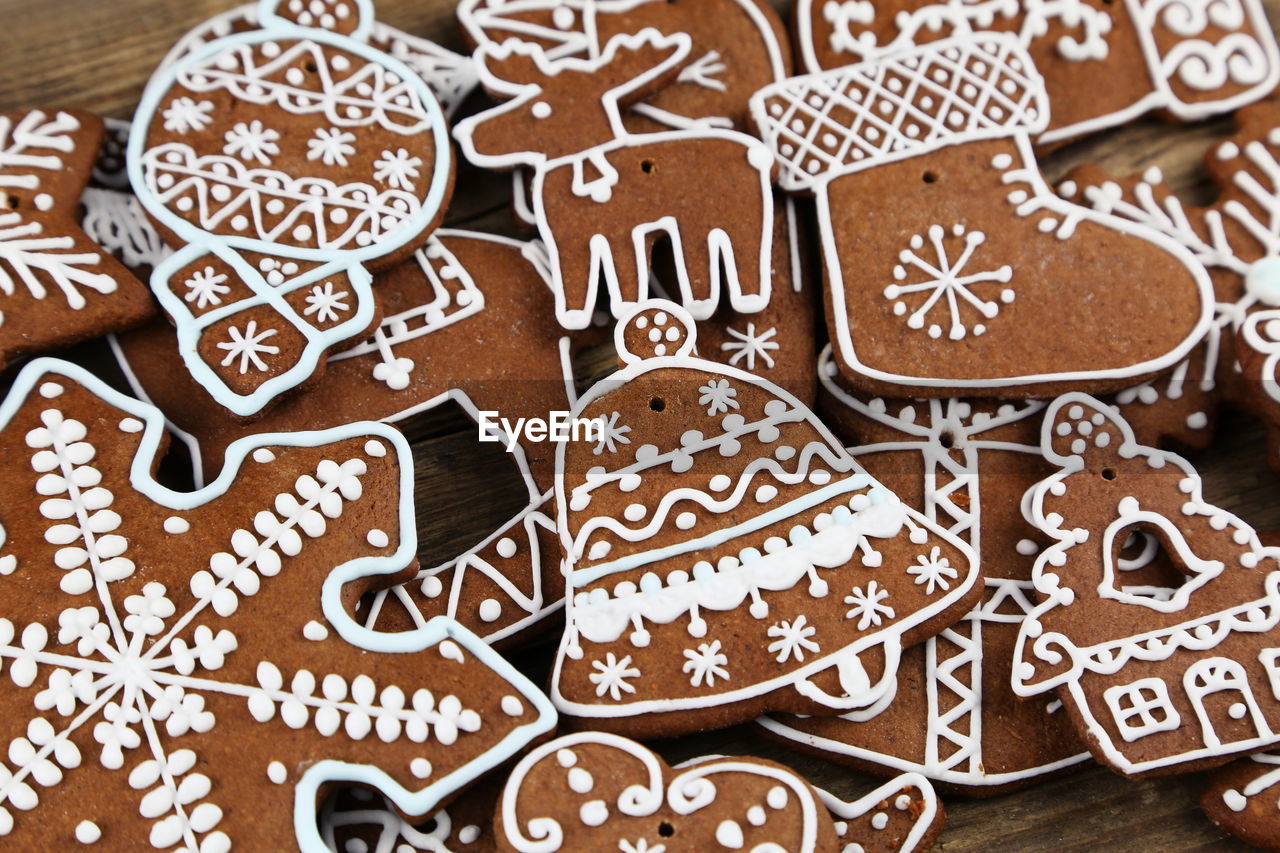 Close-up of christmas gingerbread cookies on wooden surface