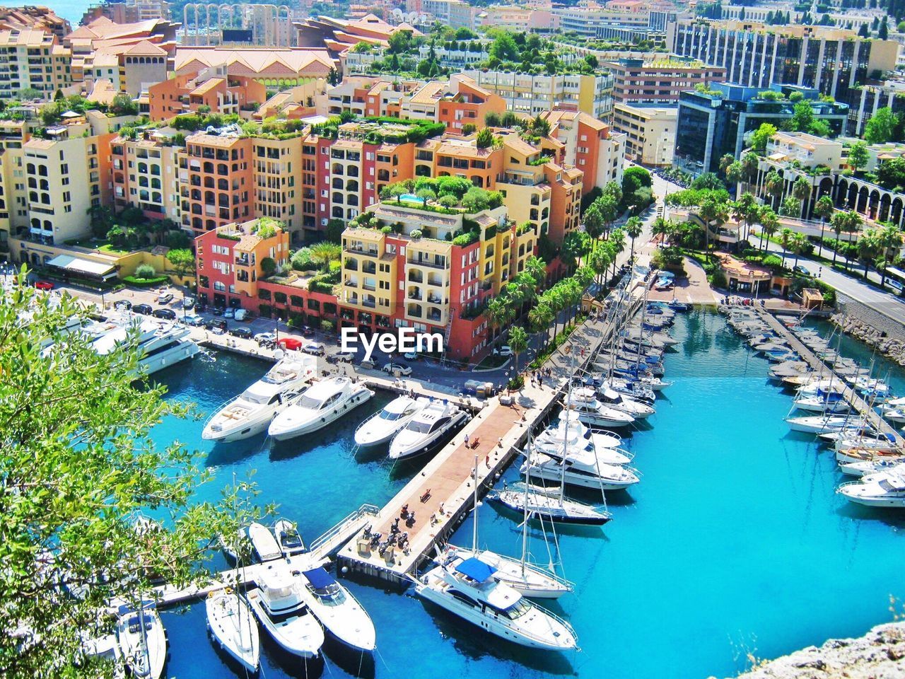 High angle view of boats moored at harbor