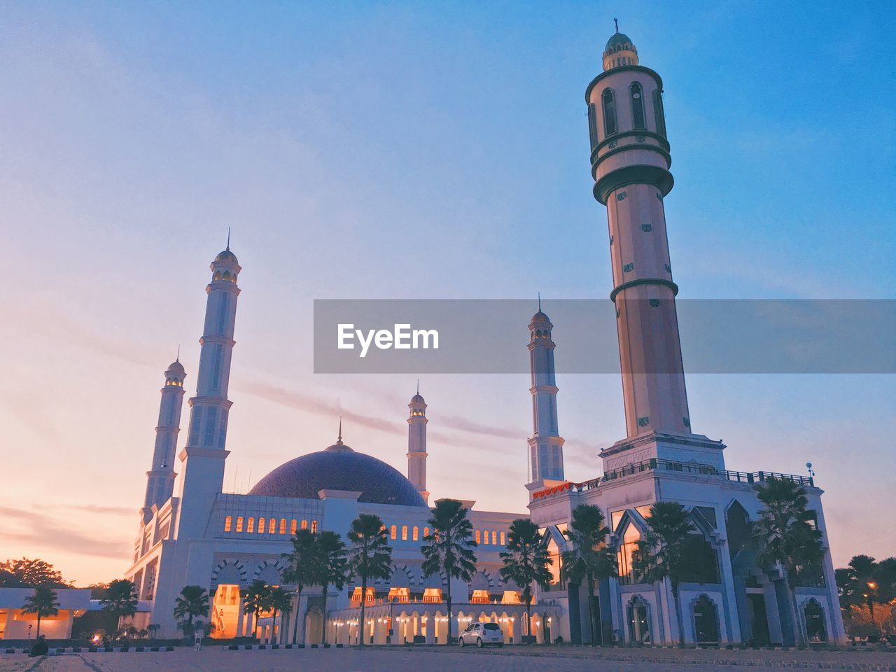 View of mosque against sky during sunset