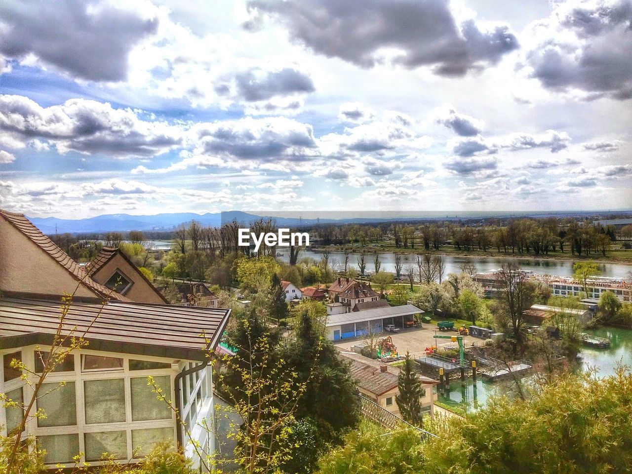 High angle view of tourist resort against cloudy sky