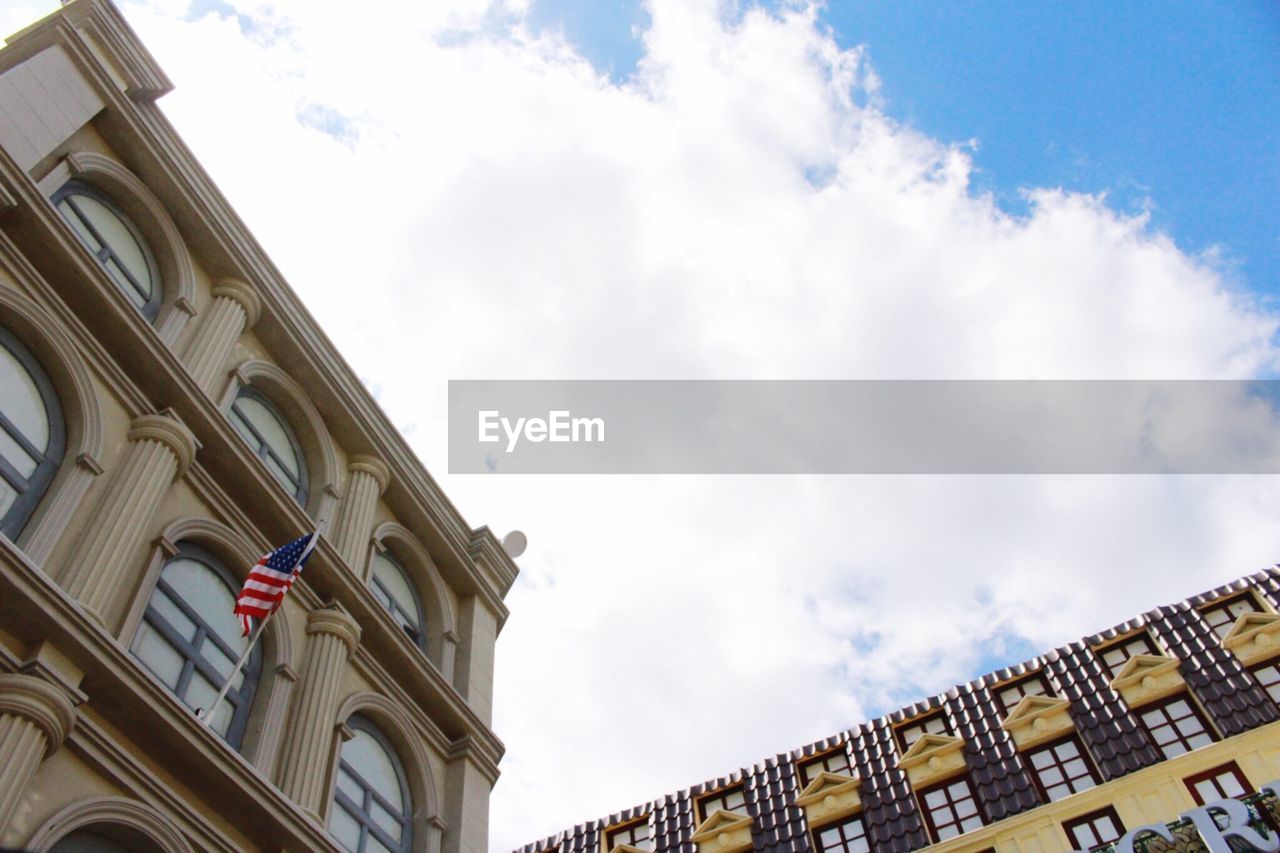 LOW ANGLE VIEW OF BUILDINGS AGAINST SKY