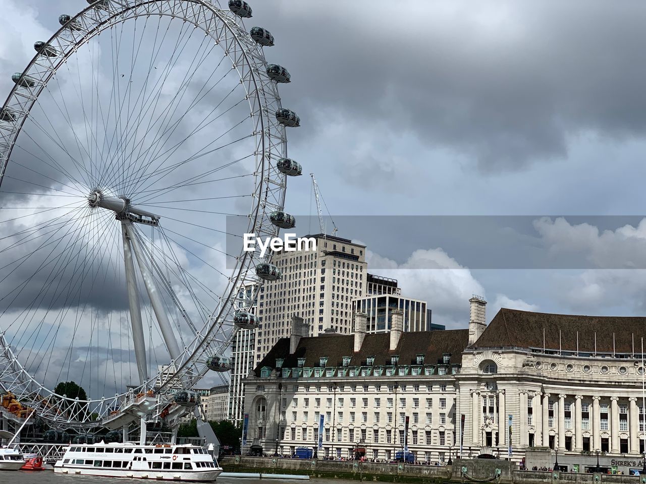 LOW ANGLE VIEW OF FERRIS WHEEL AGAINST SKY