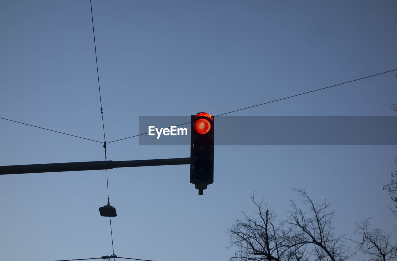 Red traffic light signal on the street, symbol for stopping