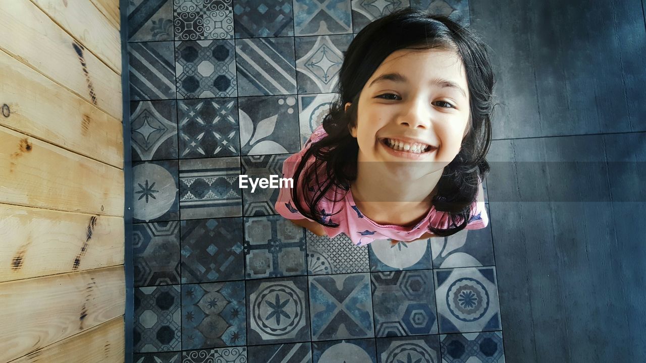 High angle view of smiling young girl