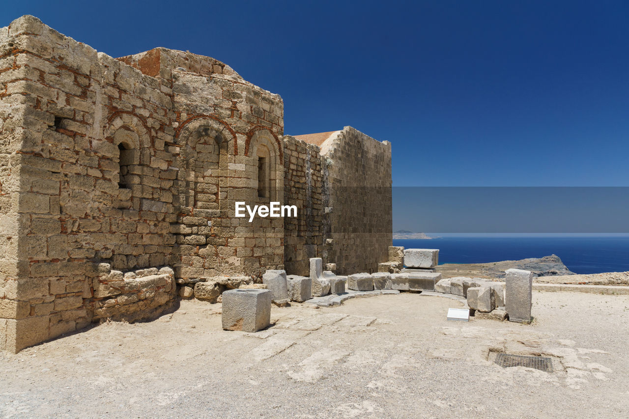 CASTLE AGAINST CLEAR BLUE SKY