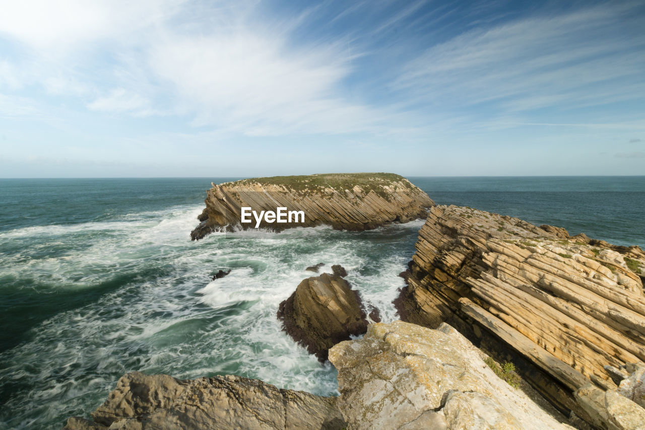 Scenic view of rocky coastline