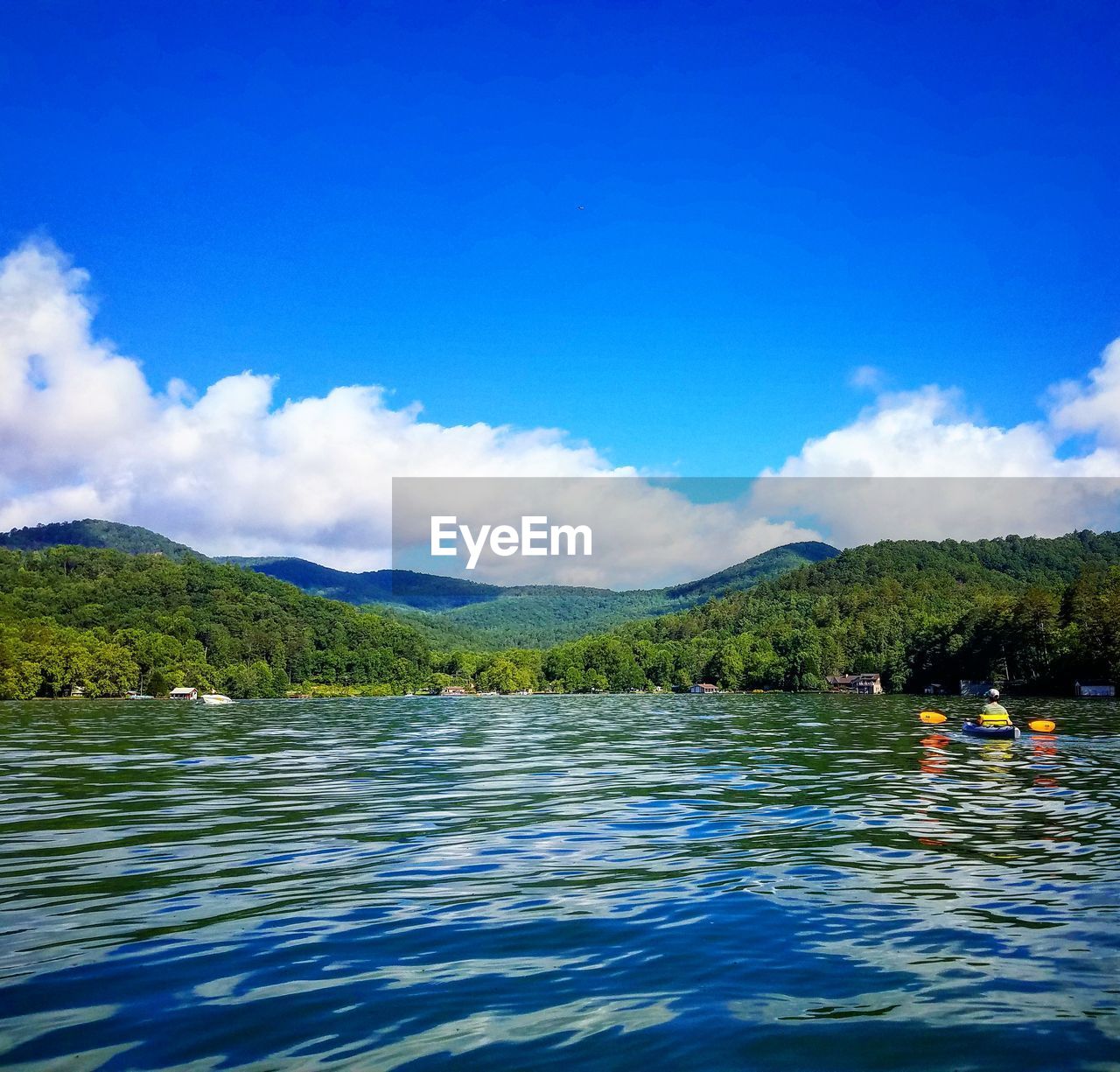 SCENIC VIEW OF LAKE AGAINST MOUNTAINS