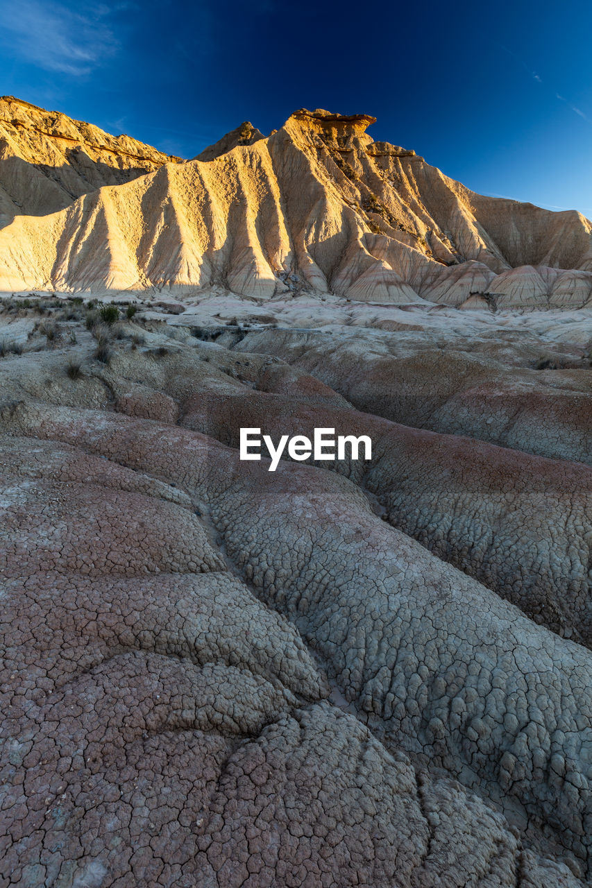 Scenic view of rocky mountains against sky