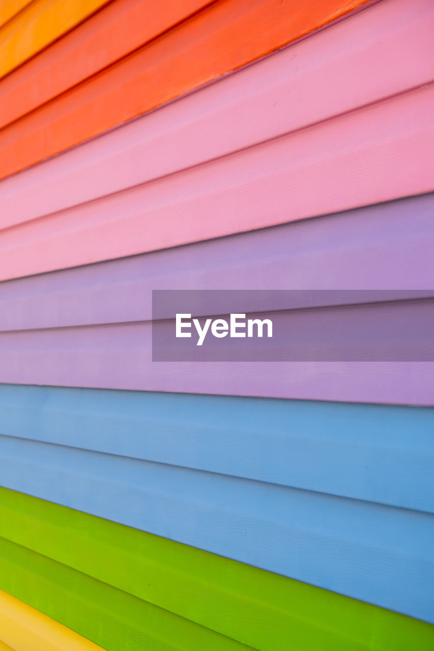 Colorful wooden texture in the colors of rainbow. lgbt pride flag crafted wooden boards. tolerance