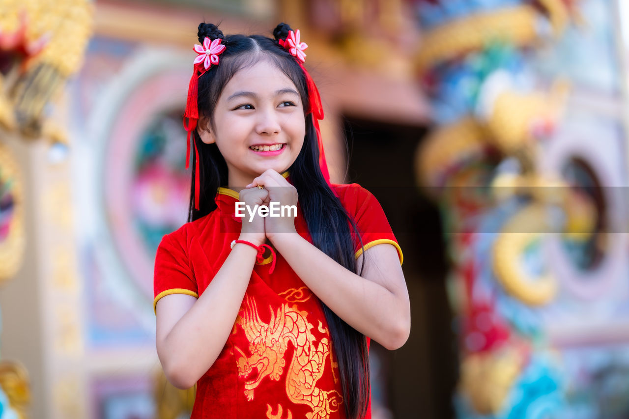 Portrait of smiling young woman