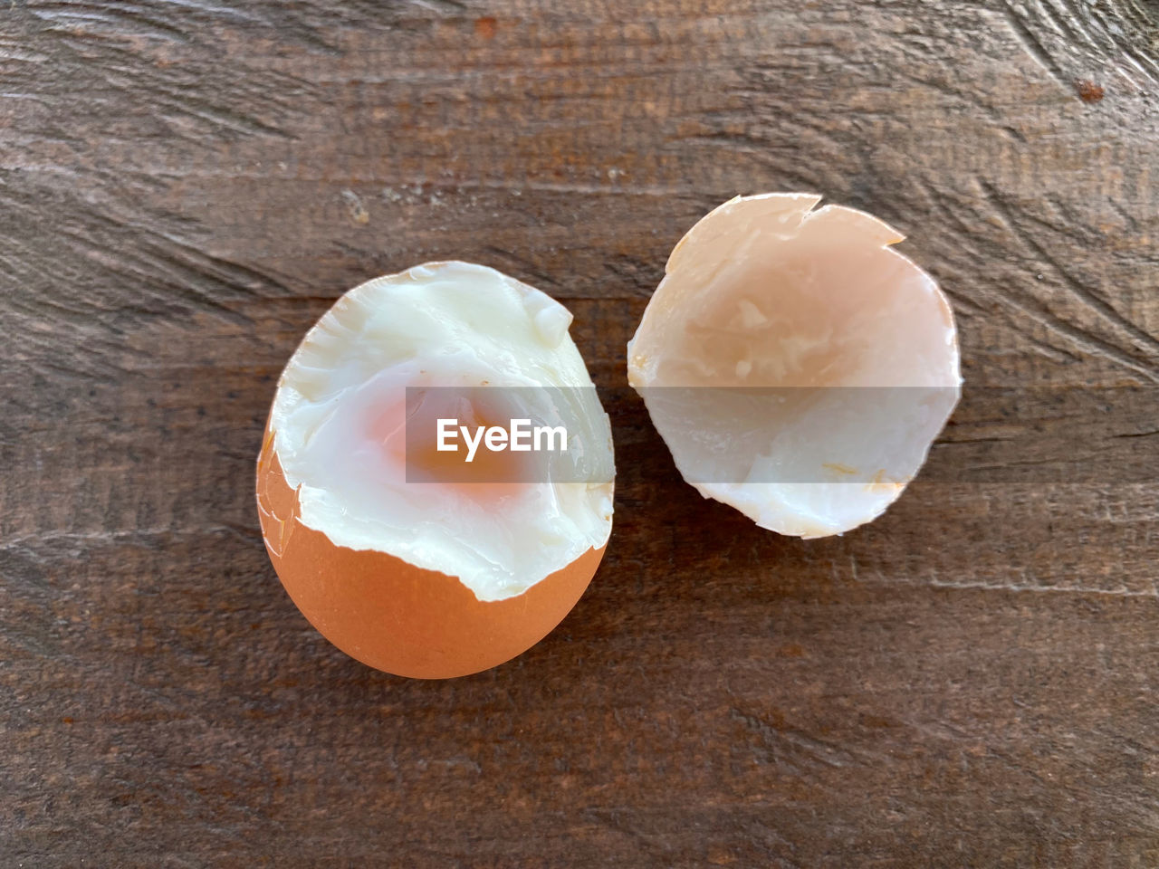 food and drink, food, egg, healthy eating, freshness, wellbeing, egg yolk, no people, wood, table, still life, indoors, shell, close-up, produce, cracked, high angle view, raw food, directly above, eggshell, studio shot