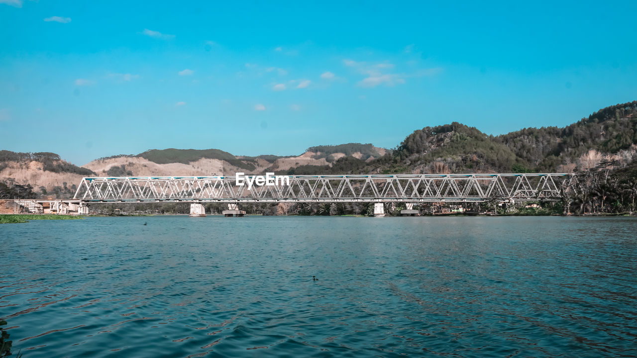 BRIDGE OVER SEA AGAINST SKY