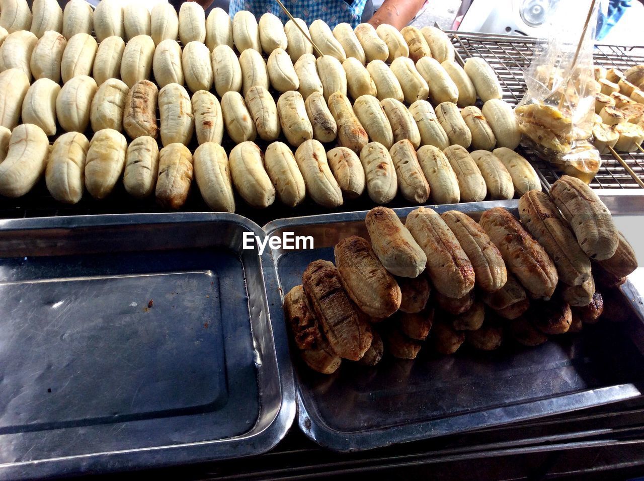 High angle view of baked food for sale in bakery