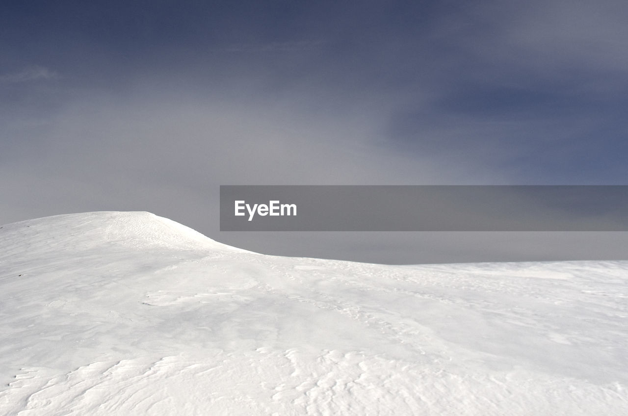 Snowcapped mountain against sky