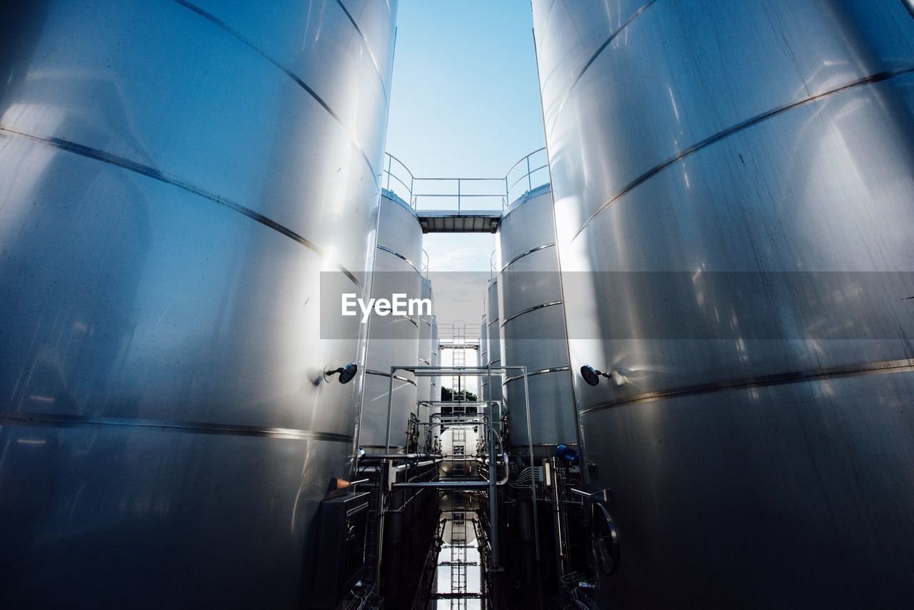 Low angle view of storage tanks at factory