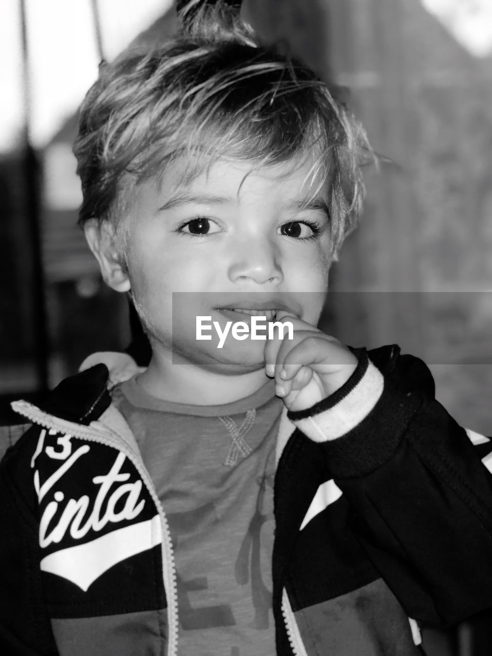 CLOSE-UP PORTRAIT OF CUTE BOY OUTDOORS