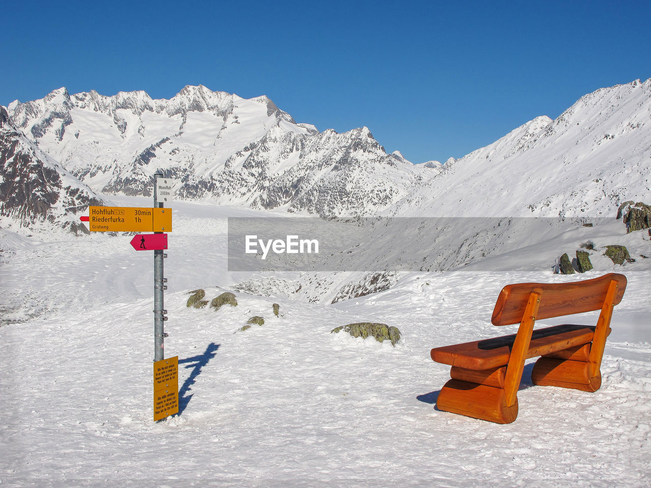 Scenic view of snow covered mountain against sky