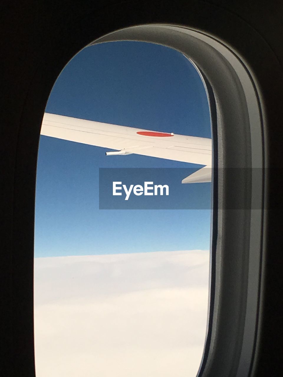 AIRPLANE SEEN THROUGH WINDOW