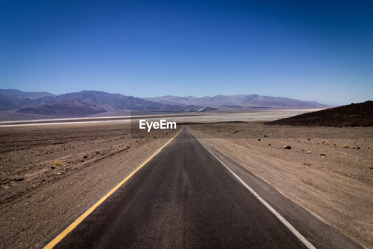 Empty road at against sky at death valley national park