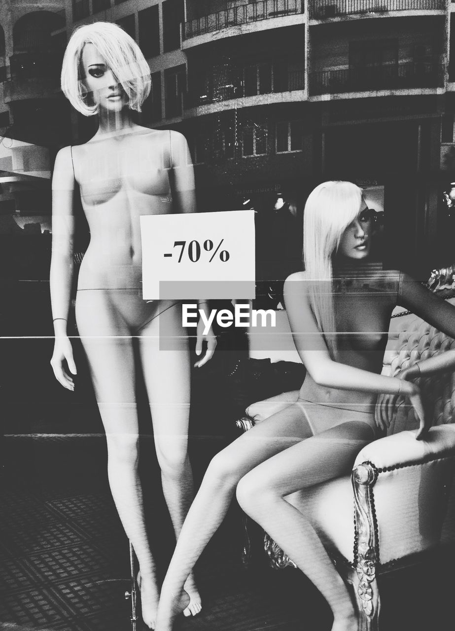 Female mannequins in store window