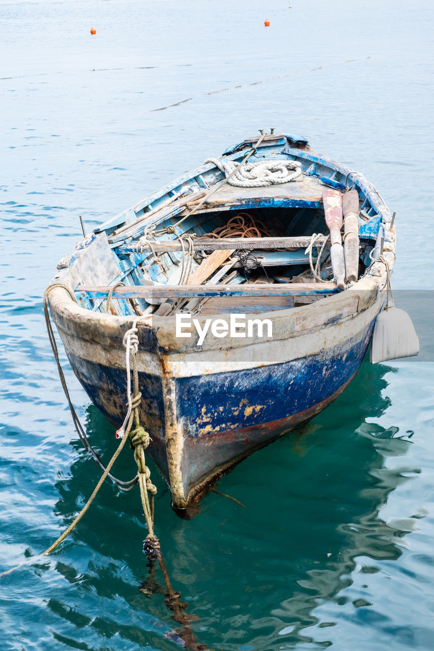 Fishing boat moored in sea