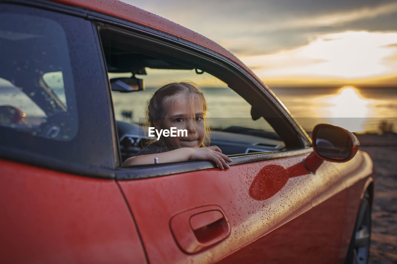 Portrait of boy in car