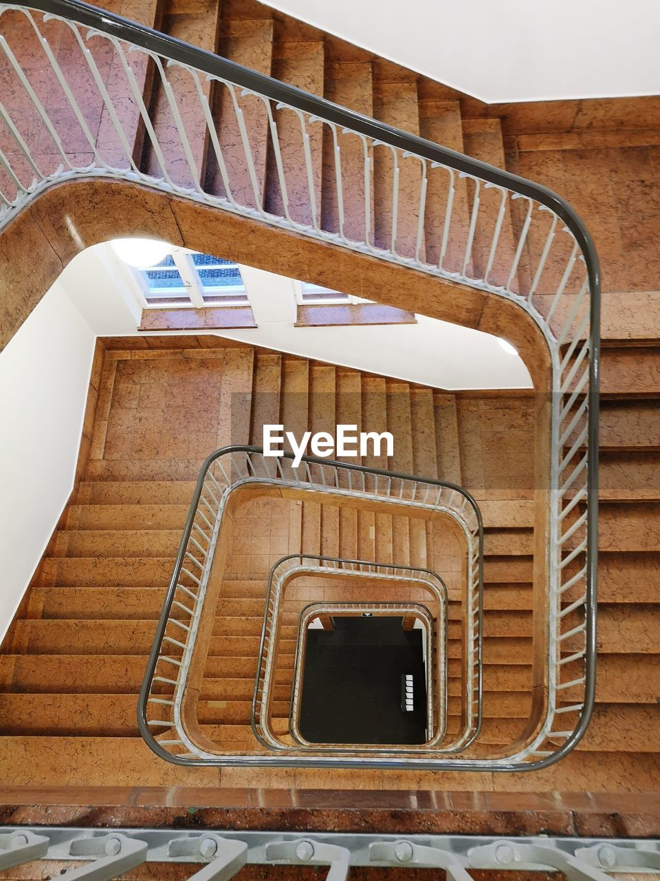 DIRECTLY BELOW SHOT OF SPIRAL STAIRCASE