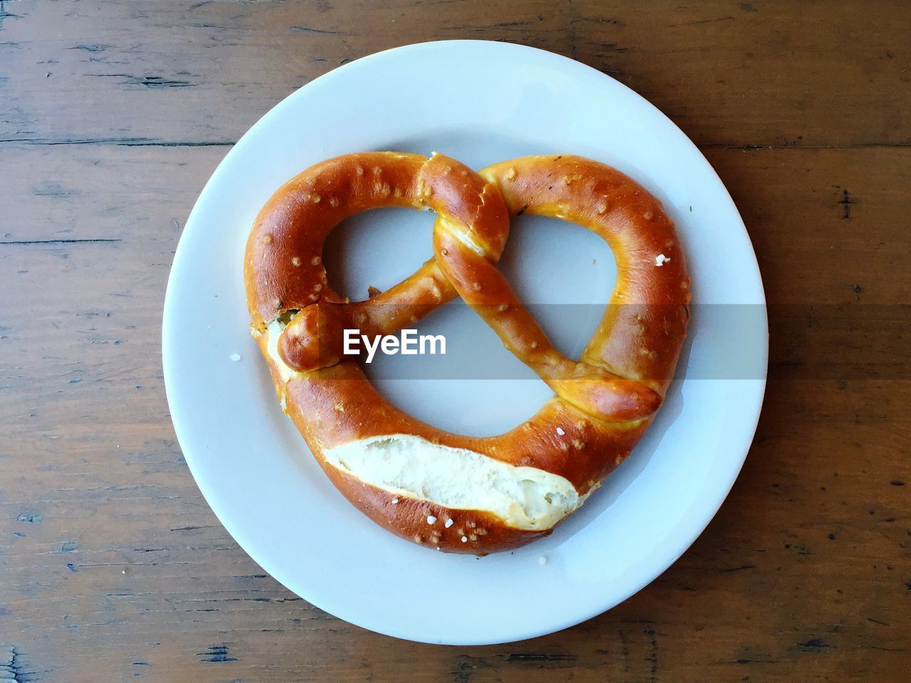 High angle view of pretzel in plate on table