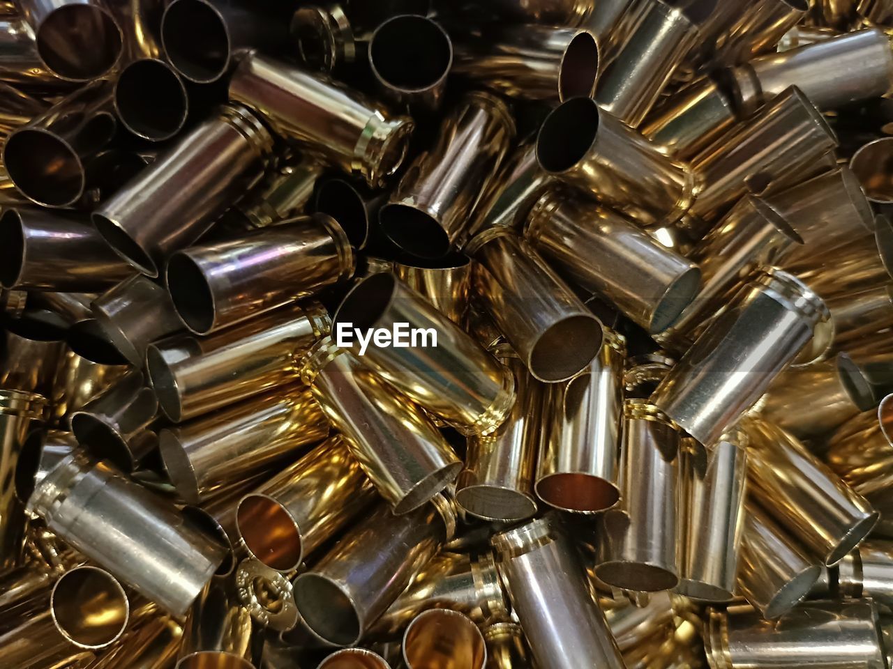 ammunition, firearm, bullet, metal, large group of objects, weapon, no people, abundance, close-up, full frame, indoors, backgrounds, iron, still life, gun barrel, high angle view
