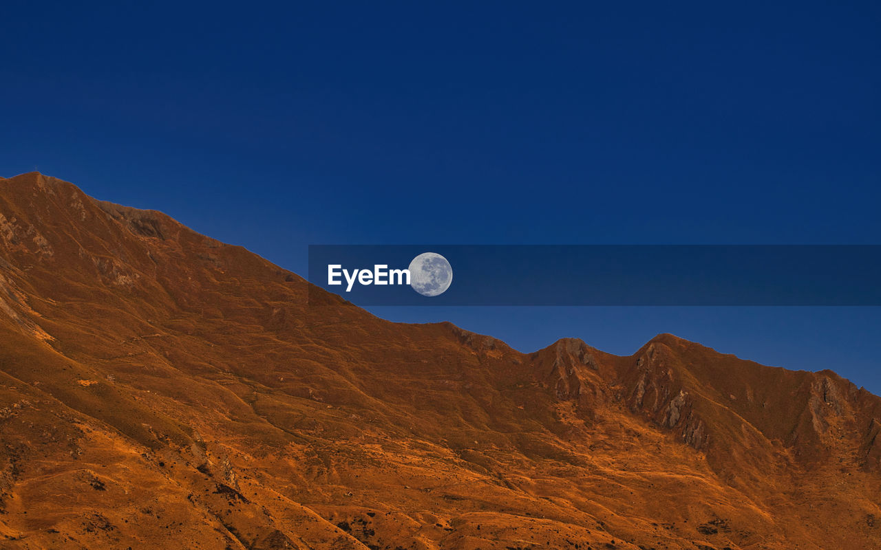 Moon over roys peak