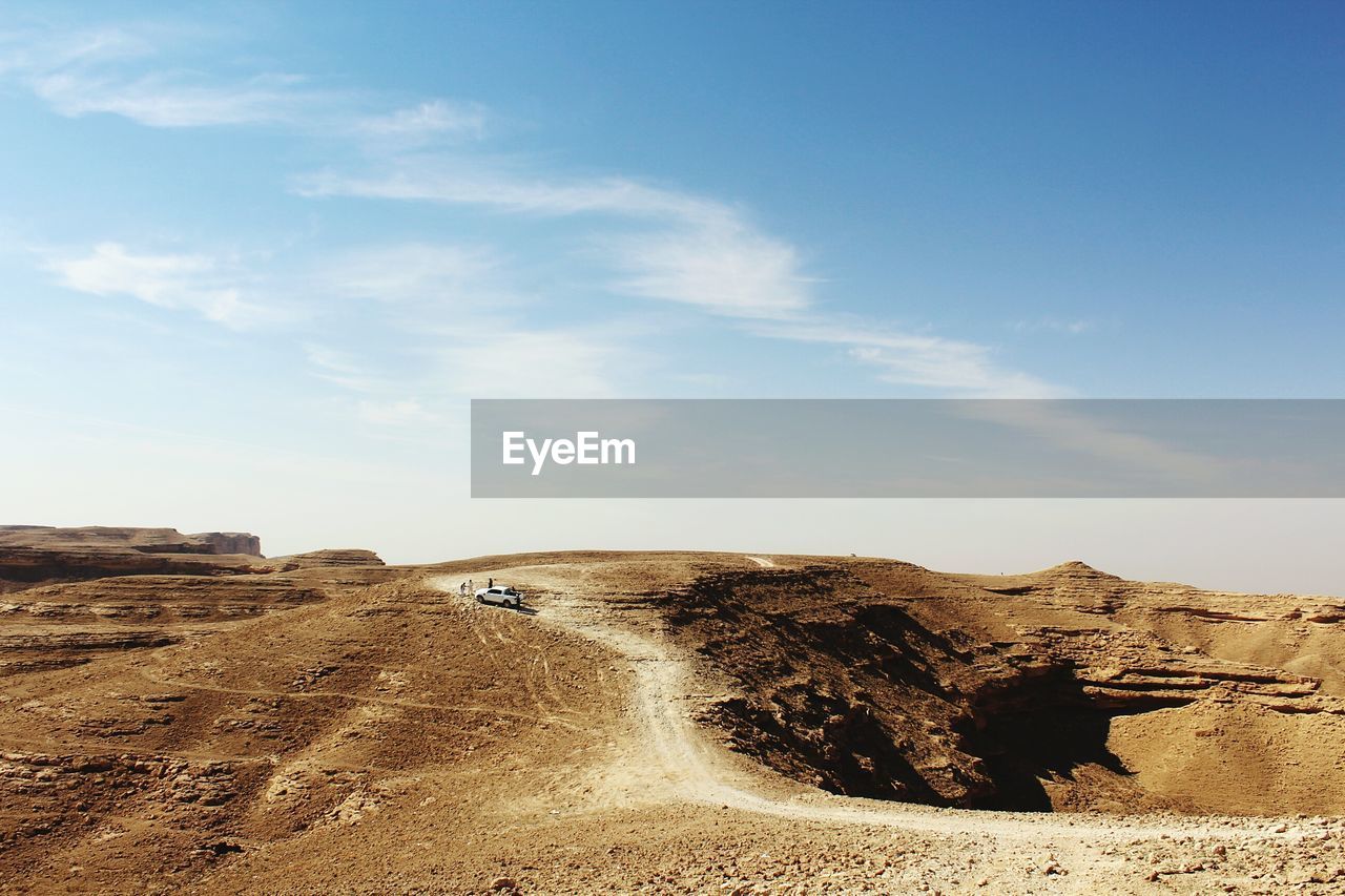 Scenic view of desert against sky