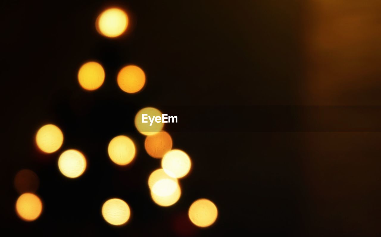 Defocused image of illuminated christmas lights