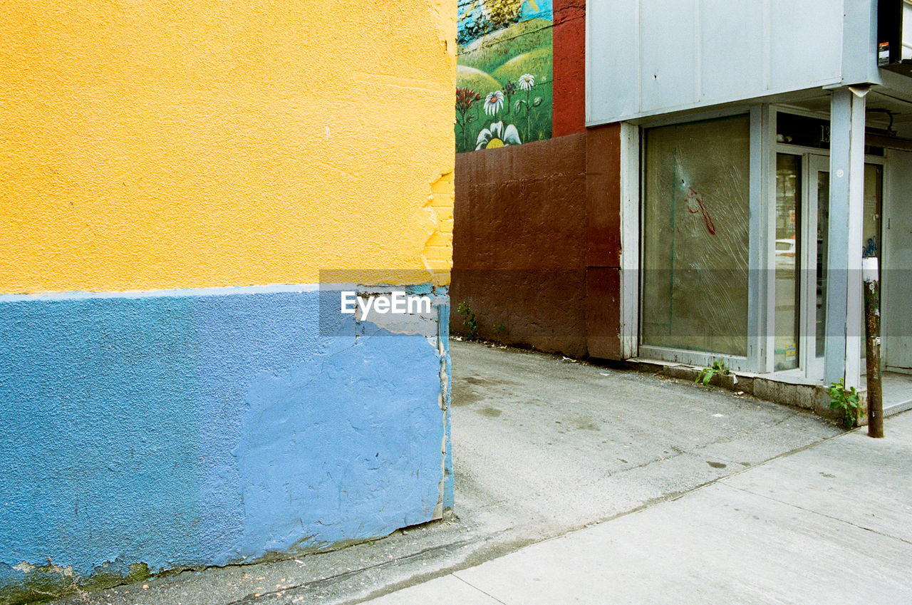 OPEN DOOR OF YELLOW HOUSE