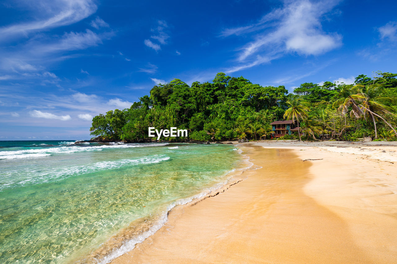Scenic view of beach against sky