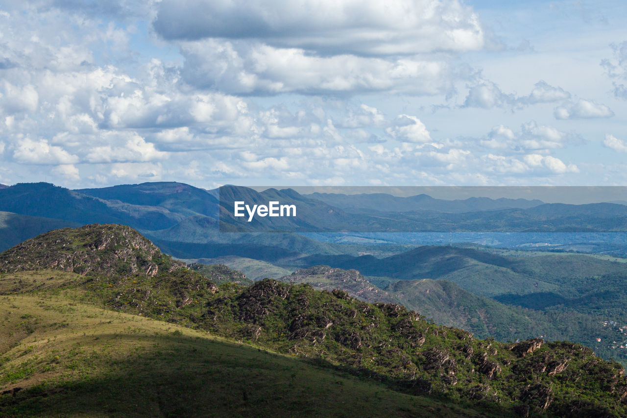 SCENIC VIEW OF VALLEY AGAINST SKY