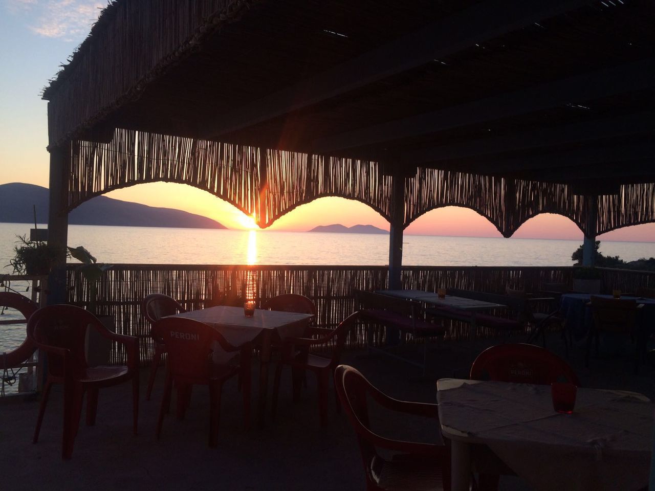 DECK CHAIRS AT SUNSET