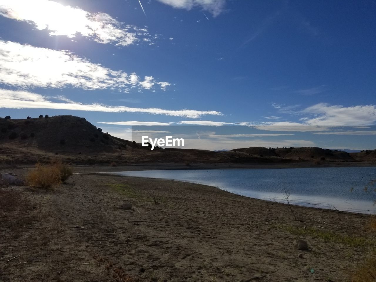 VIEW OF BEACH AGAINST SKY