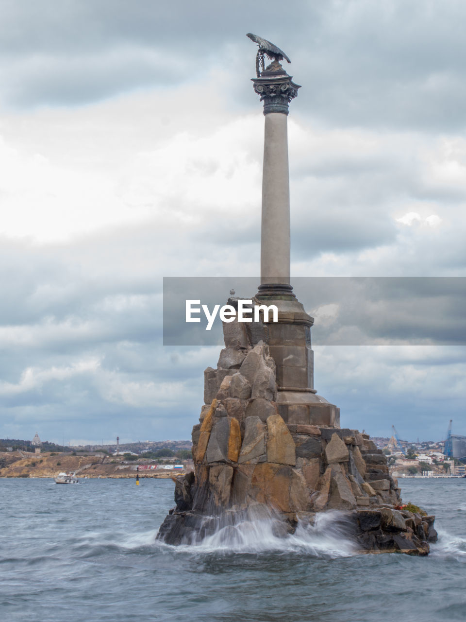 VIEW OF STATUE IN SEA